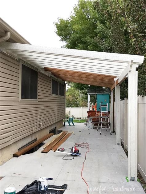 attach metal patio roof to house vinyl siding|attaching roof to vinyl siding.